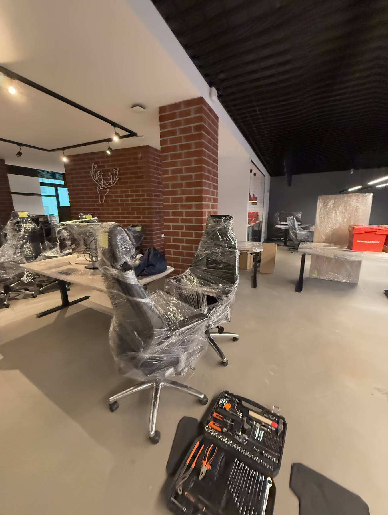 Office chairs wrapped in film