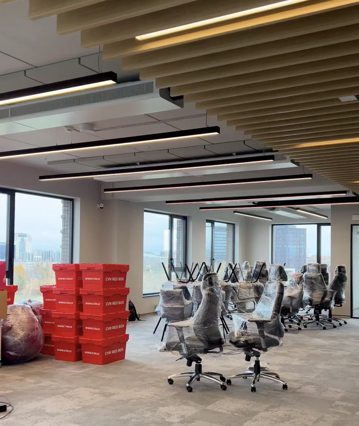 Office move — crates and chairs in the new office