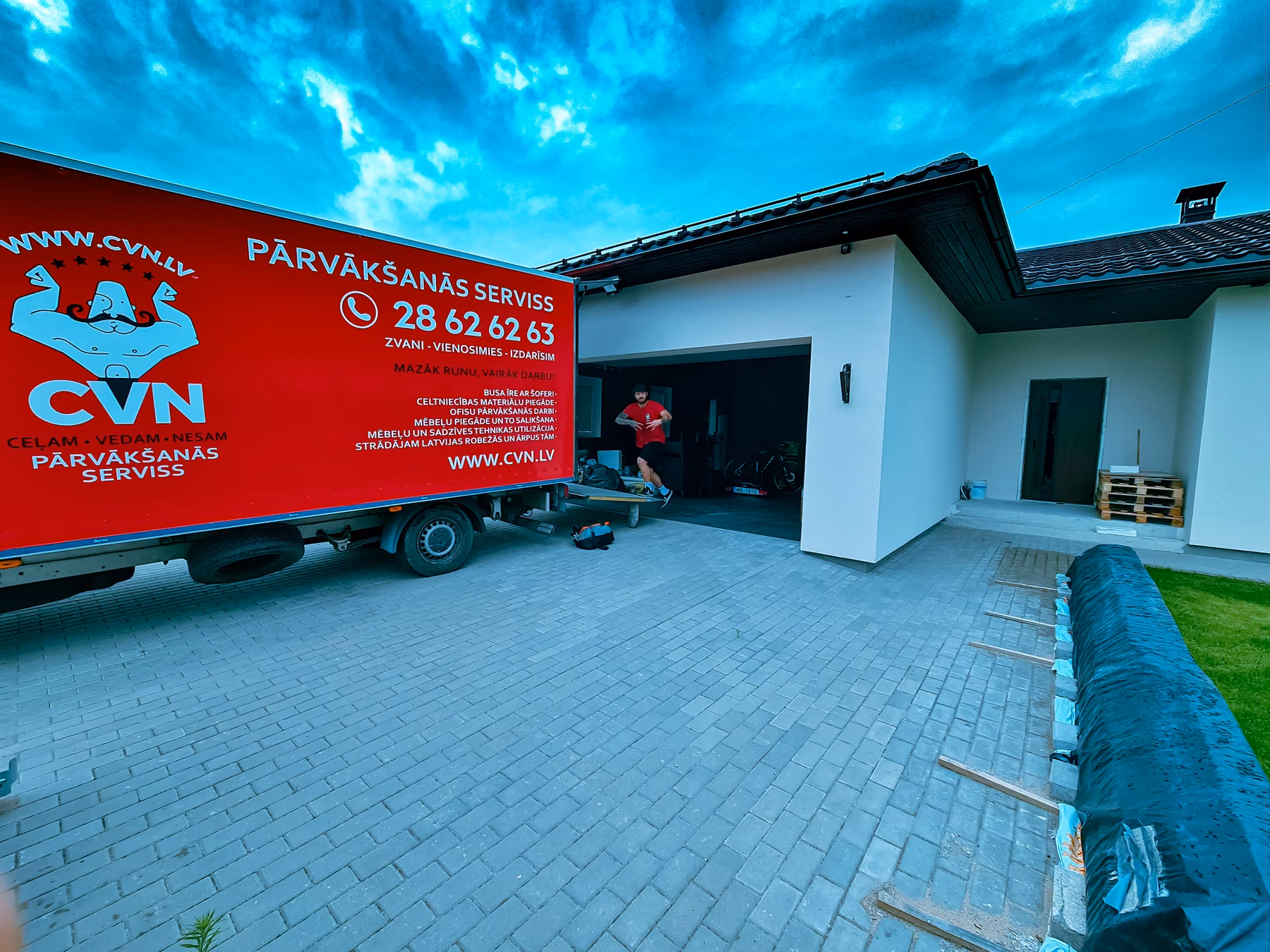 House move — CVN truck at a private house